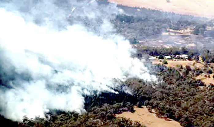 Austrália: calor e ameaças de incêndio levam milhares a deixar casas